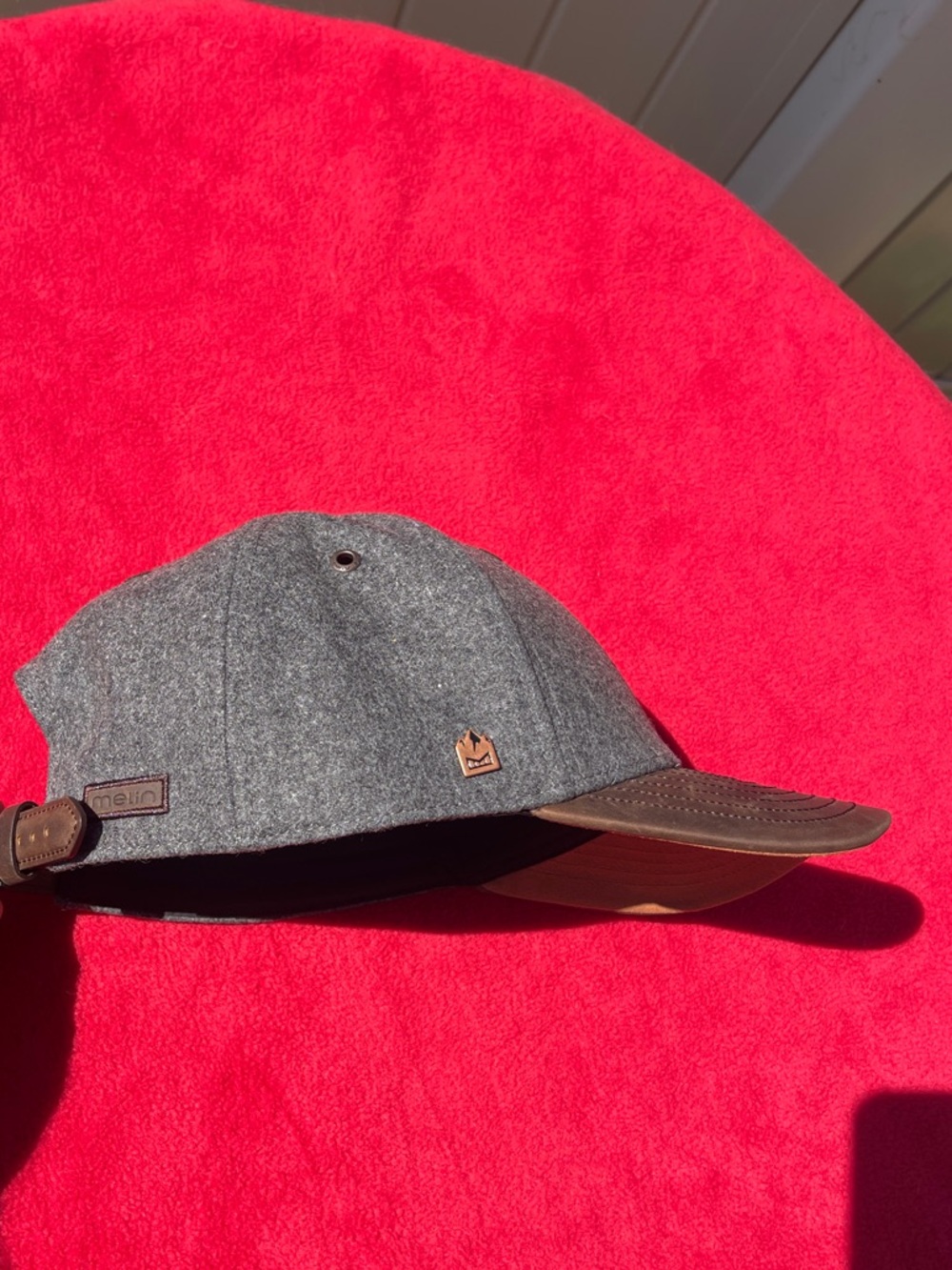 Melin Luxury Gray Cap with Brown Brim. Unused New Condition.